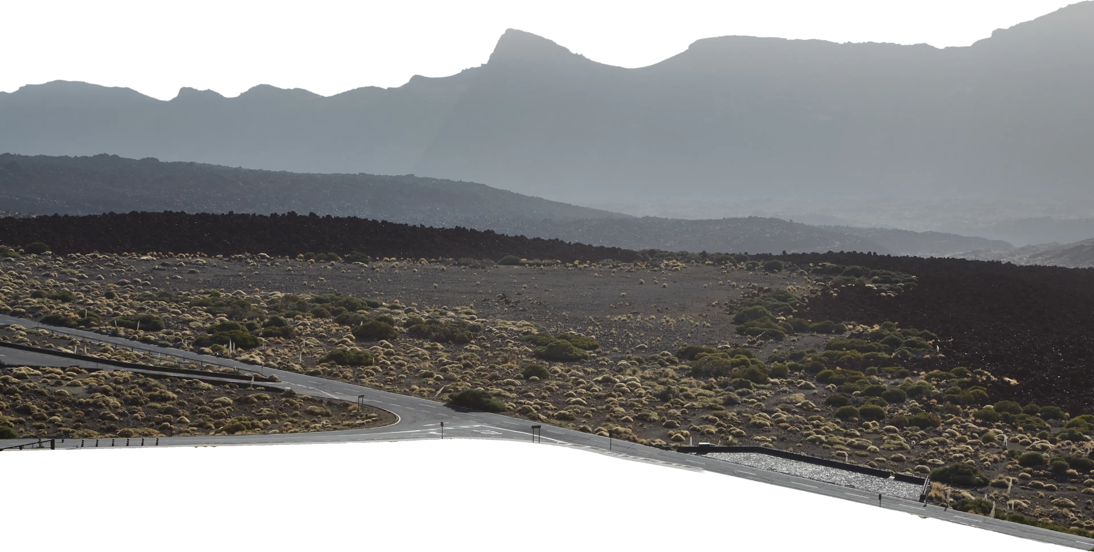road with an intersection on a volcanic desert landscape, representing an empty canvas
